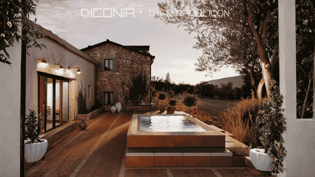 Mini-piscine ICONIA® Bio.design installée sur une terrasse en pierre naturelle devant une maison en pierre en Ardèche, par Florasol.
